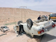 عبور سگ از جاده اشتهارد به واژگوني دو خودرو انجاميد